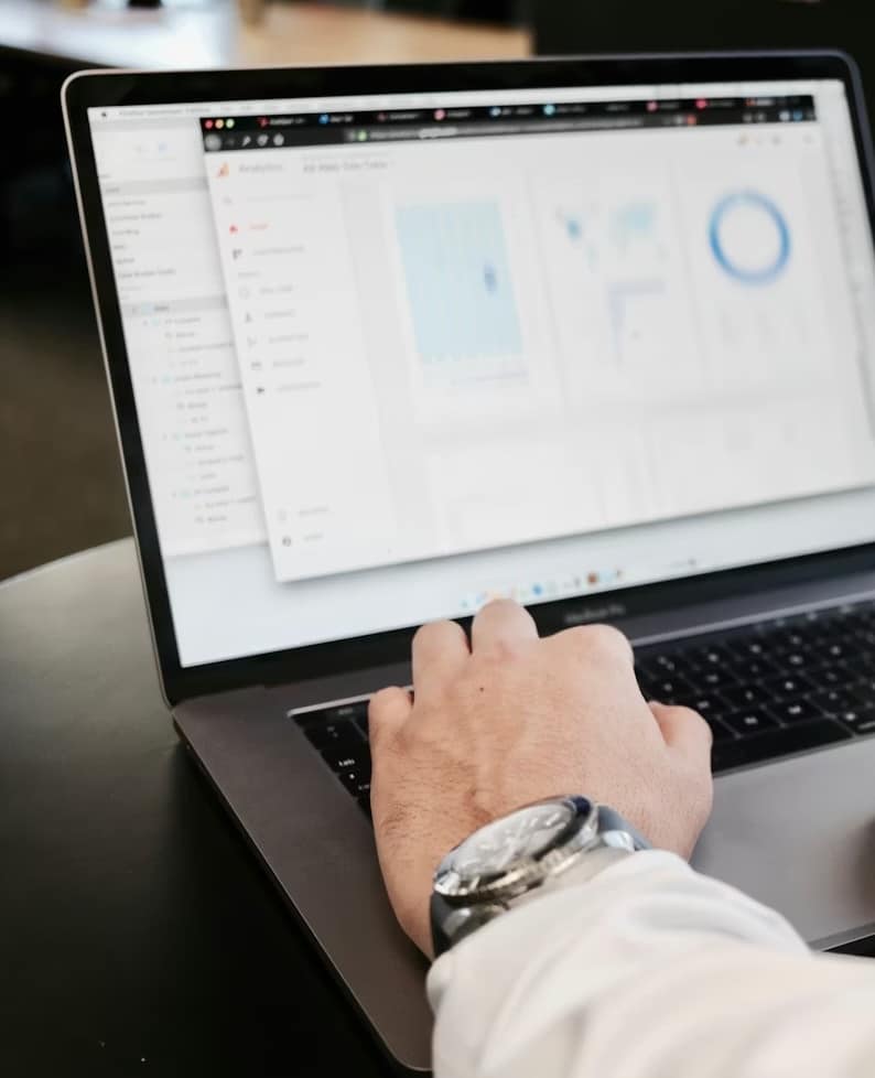Person working on computer in a corporate setting